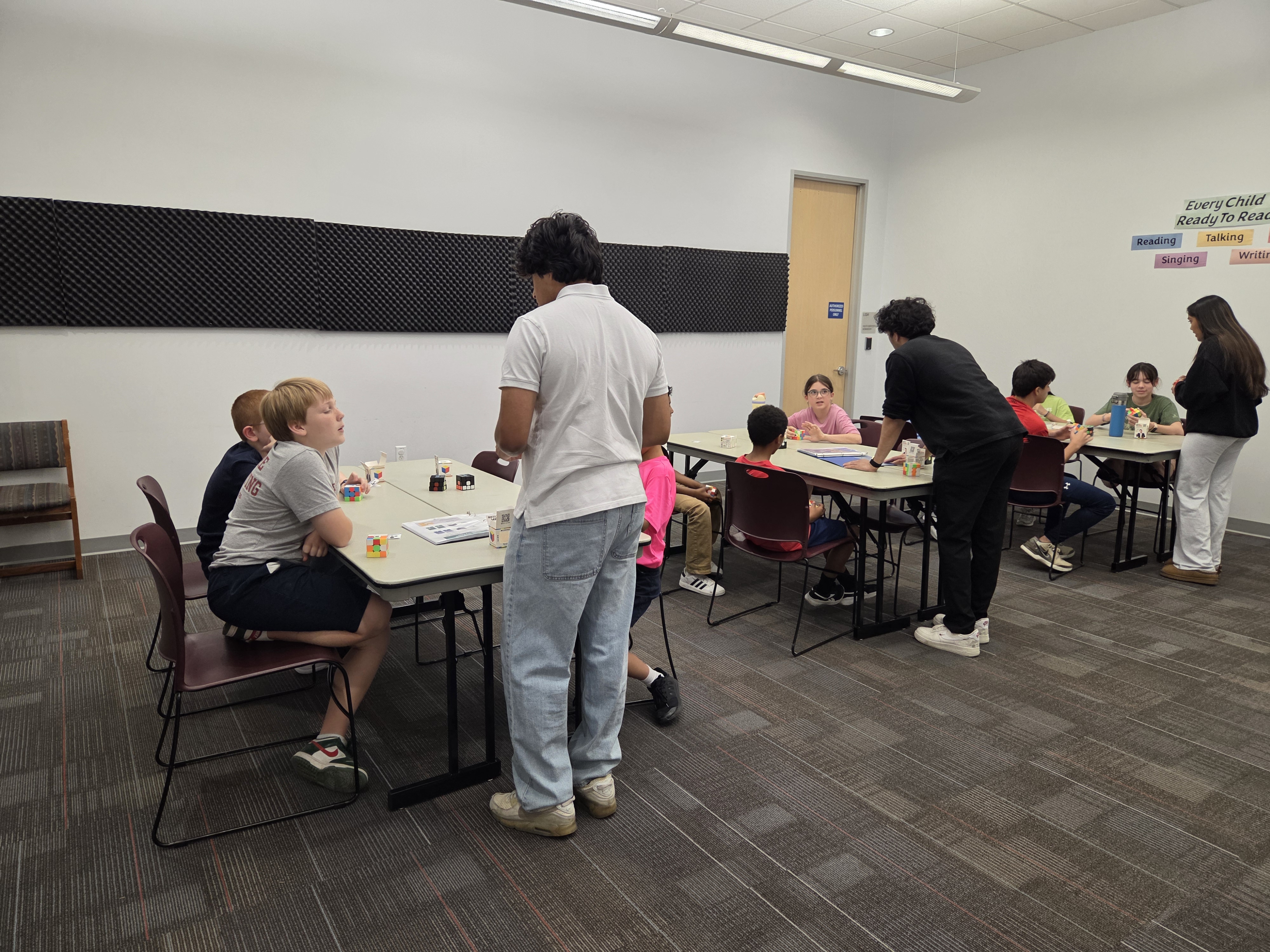 Cube Leader helping a student one-on-one